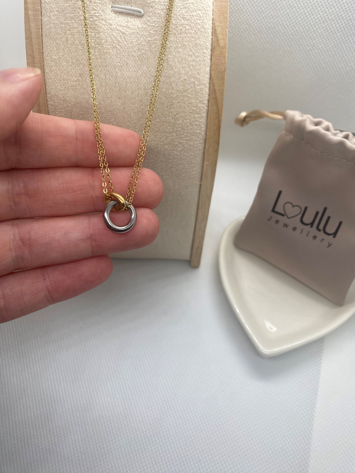 Elegant two colour circle pendant